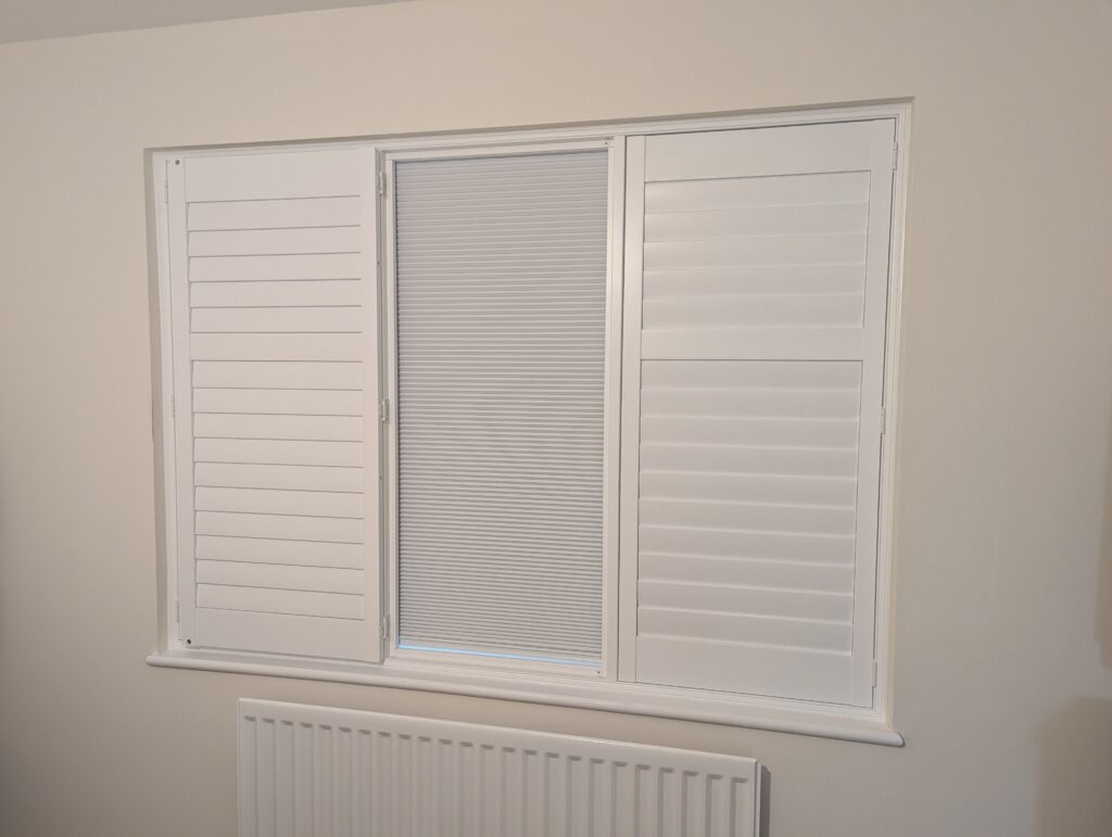 Shutter With Integrated Blackout Blind