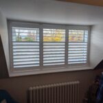 white shutter with integrated blackout blinds installed in chester