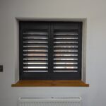 Anthracite Tracked Shutters Over Bi Folds in Chester