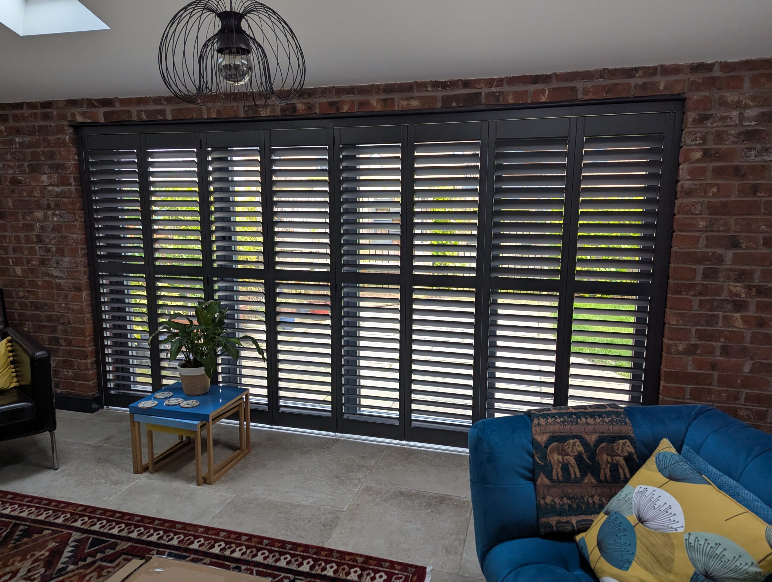 Anthracite Tracked Shutter Over Bi Folds in Chester