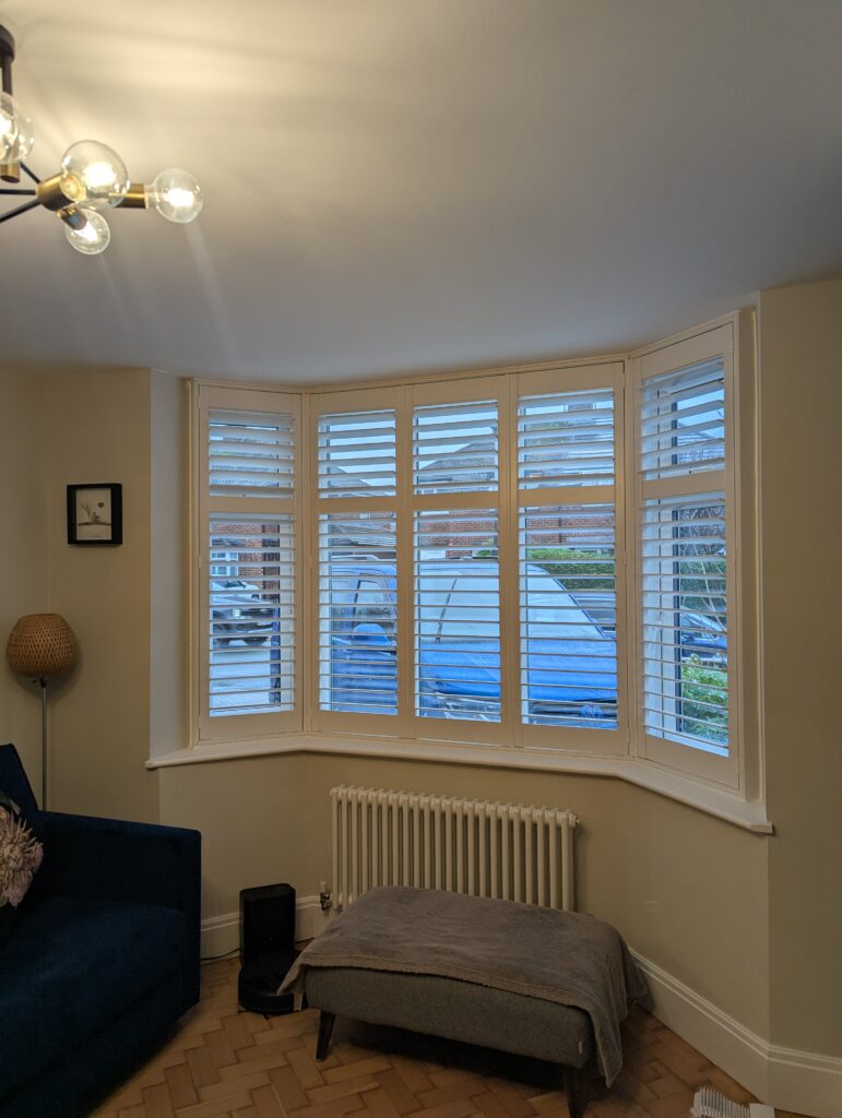 Decorators White MDF bay shutter installed in Chester