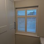 Decorators White MDF bay shutter installed in Chester