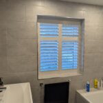 Decorators White MDF bay shutter installed in Chester