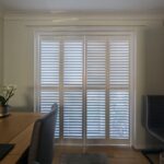 Harris Hardwood Tracked Shutter over French Doors in Buckley North Wales