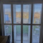Harris Hardwood Tracked Shutter over French Doors in Buckley North Wales