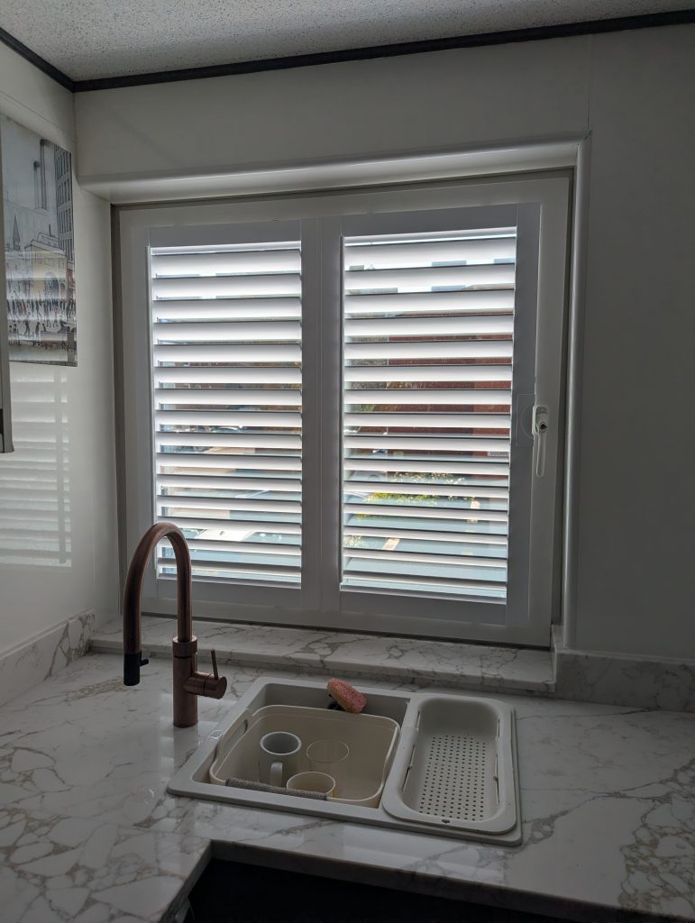 White perfect fit shutters installed in Manchester