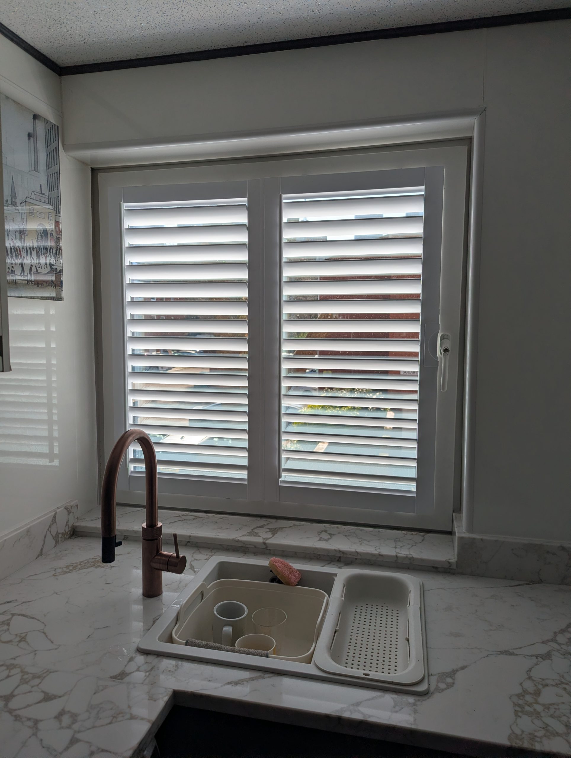 White perfect fit shutters installed in Manchester