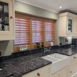 Oak Stain Hardwood Shutters installed in Widnes