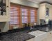 Oak Stain Hardwood Shutters installed in Widnes