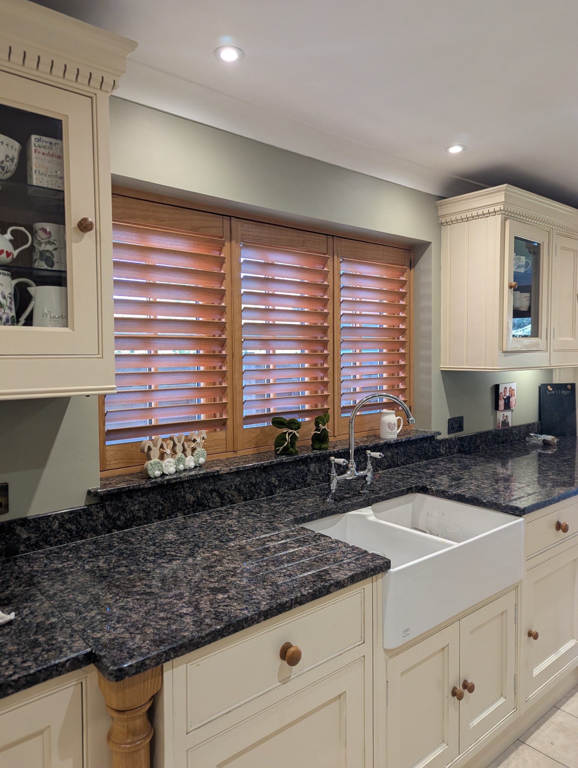 Oak Stain Hardwood Shutters installed in Widnes