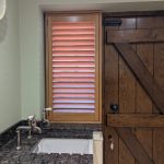Oak Stain Hardwood Shutters installed in Widnes